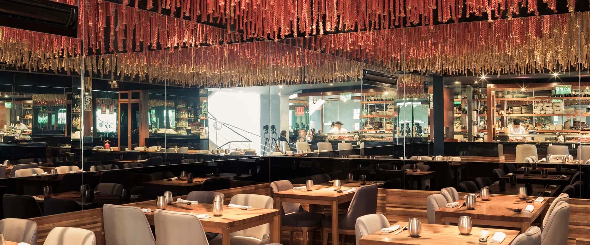 Maido Lima dining space with Nikkei cuisine plating